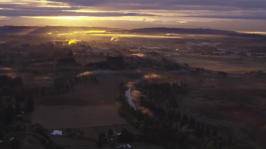 Large flat farmland with small bodies of water