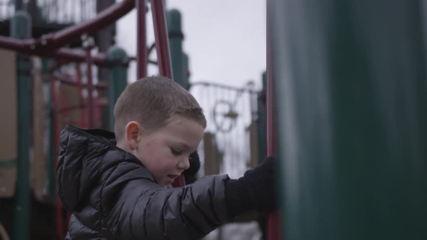 Boy playing on a playground