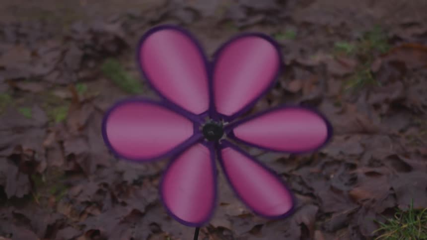A garden ornament rotates in the breeze