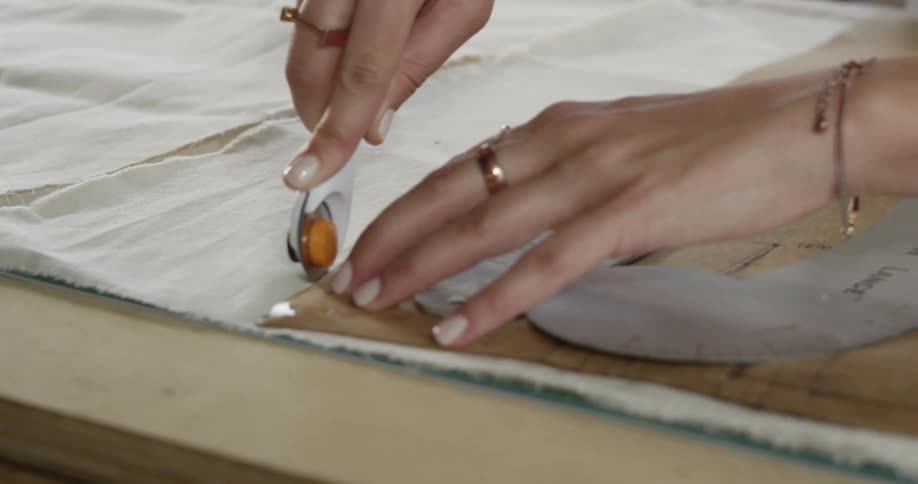 A person cutting fabric