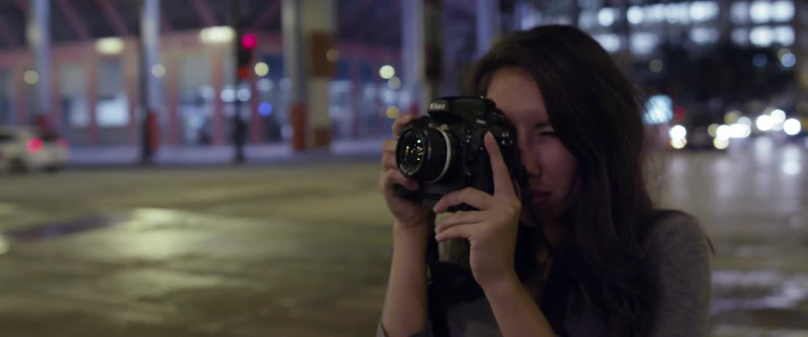 Photographer Walking In Chicago