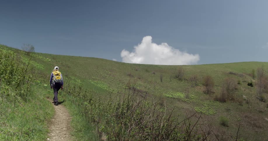 A person walking on a trail