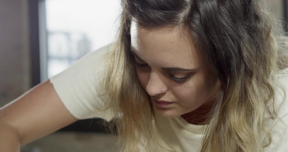 A person looking down at something
