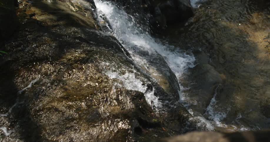 Water flows down a waterfall
