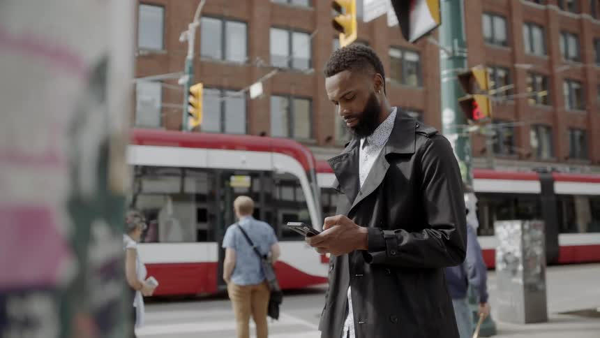 A man looking at his phone