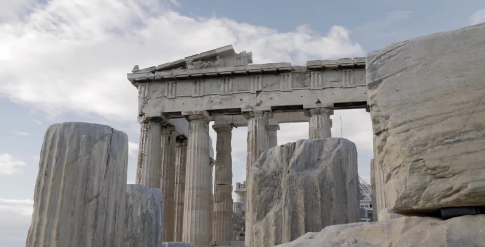 Clouds float over old ruins