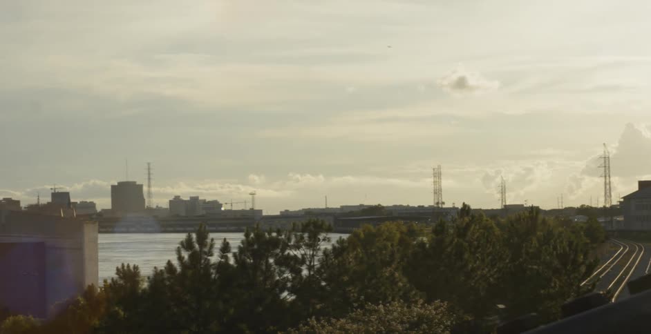 City skyline by a river