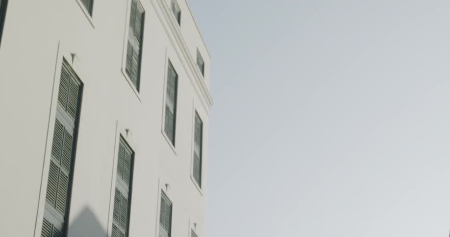 A flag is hung up on a building