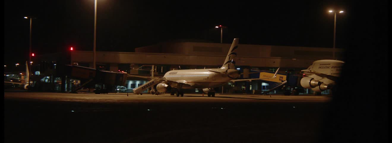 Airplanes at airport terminal gates