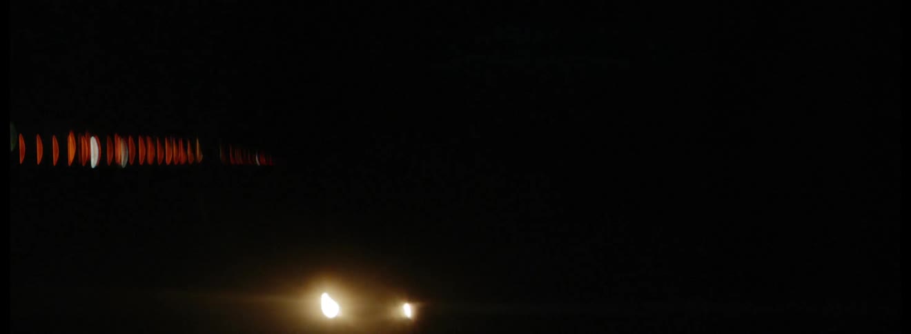 Flashing lights in darkness
