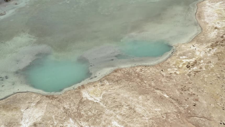 Aerial view of fog over water and the shoreline