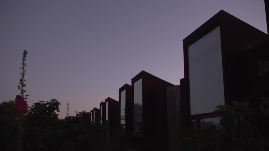 Buildings with large windows at night