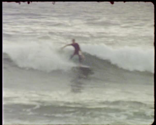 Man surfs waves