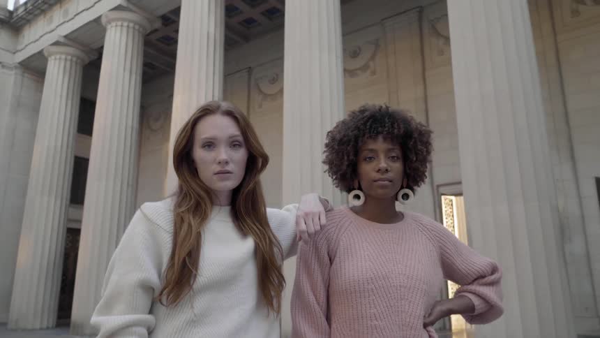Two women posing for the camera