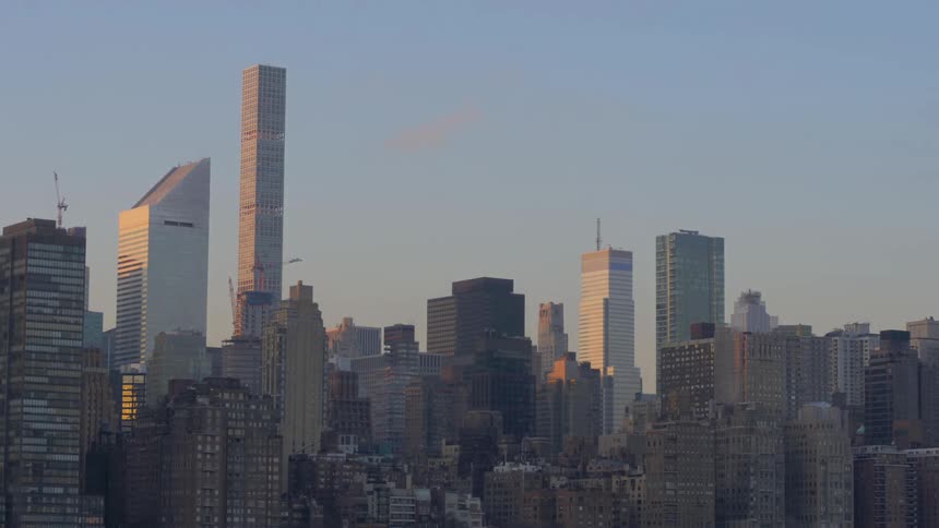 A city skyline at low sun