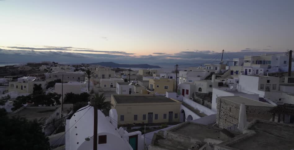 A town with many small homes at sunset