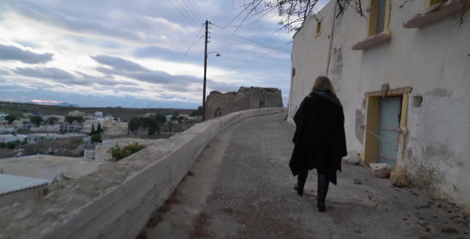 Woman walking through town