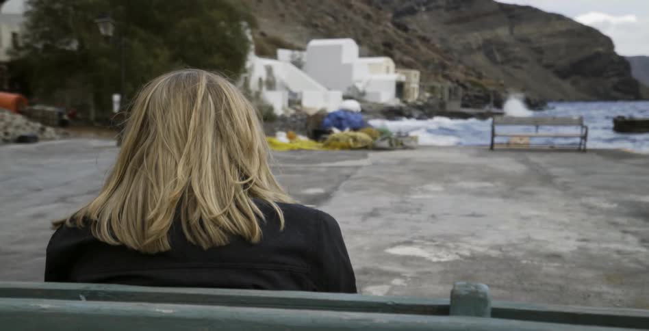 A woman sitting on a bench