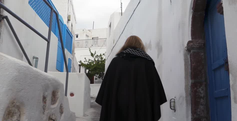 A woman walking through the city