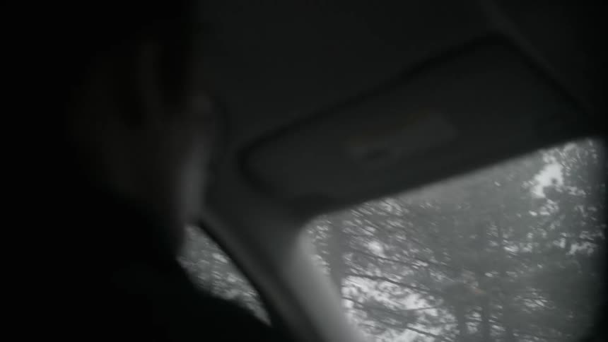 A vehicle traveling on a foggy day