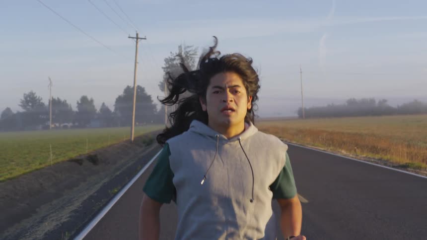 Man jogging on a rural road