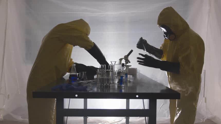 Two people are doing a science experiment