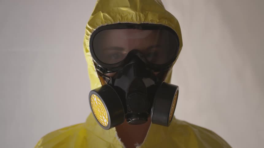 Person wearing a hazmat suit