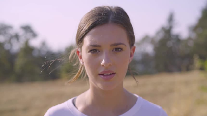 A woman looking into the camera