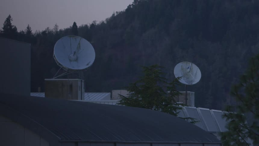 Satellite above a building
