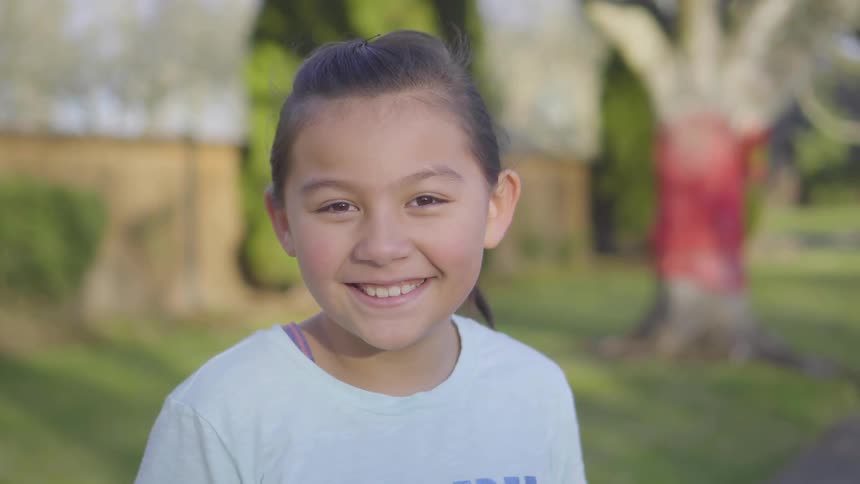 Girl smiling to the camera