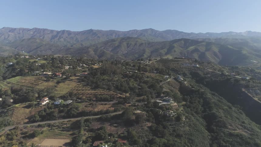 Aerial view of hills and a small town
