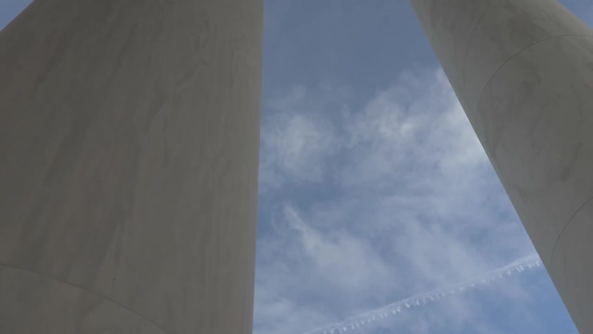 A large concrete monument on a sunny day