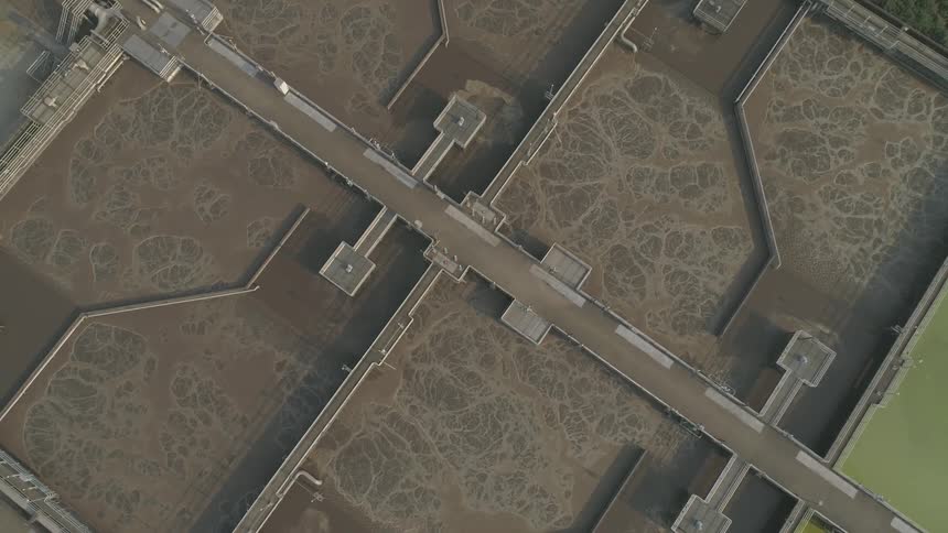 The camera looks down on some kind of water processing facility