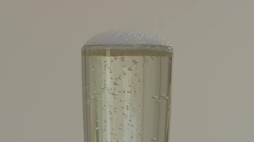 A carbonated beverage bubbling