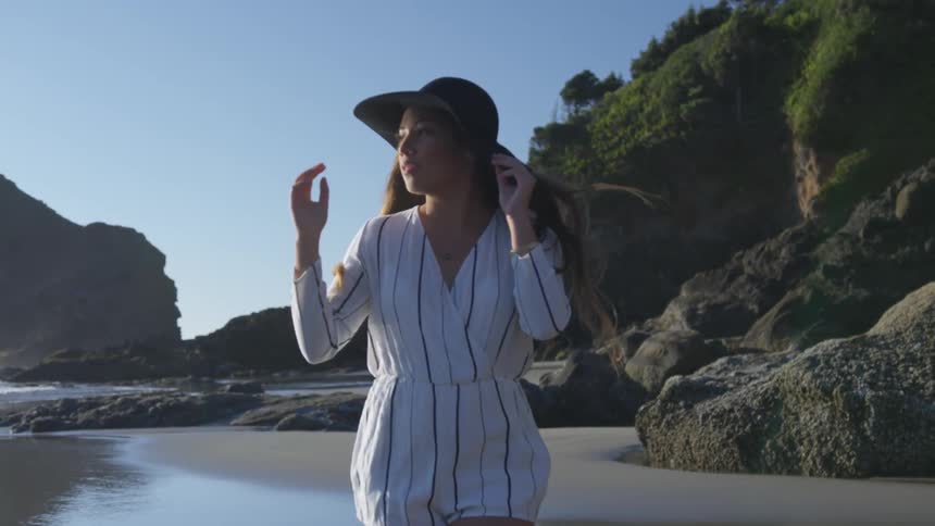 A woman walking towards the camera