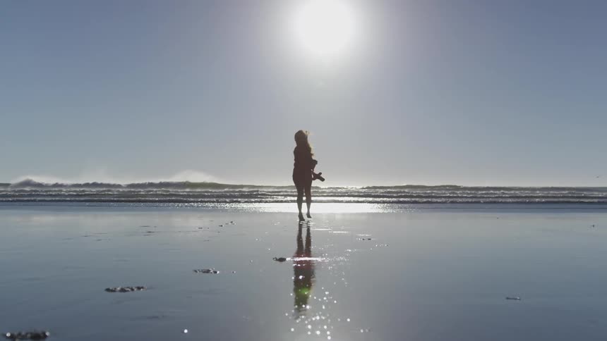 Girl running on the beach