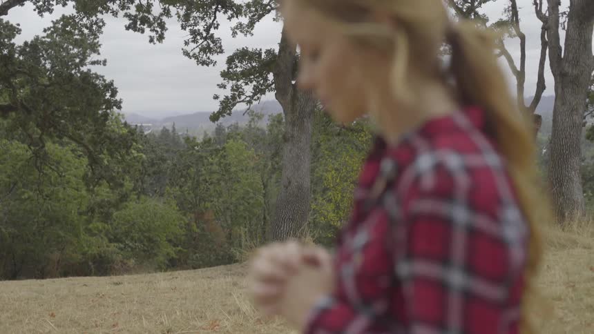 Girl standing in the forest
