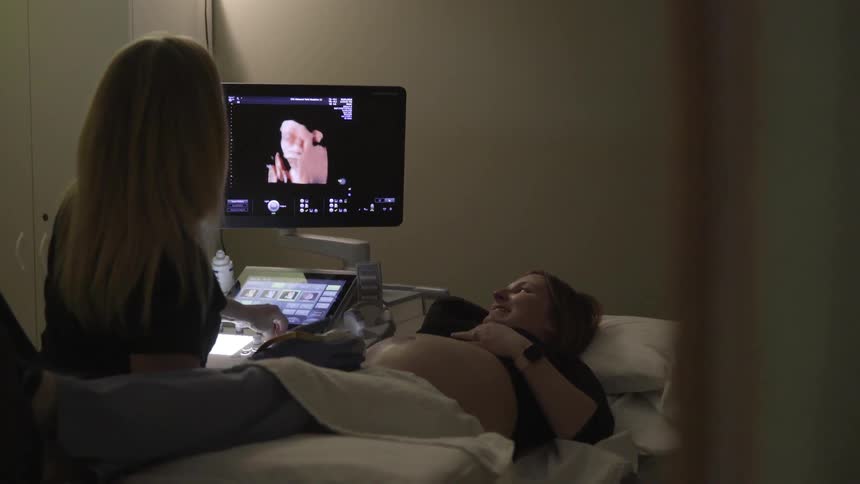 Medical professional doing imaging on patient at hospital
