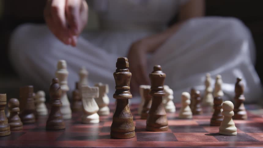 Woman playing chess