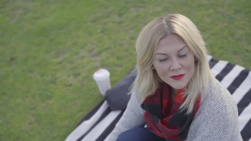Girl sitting on a blanket