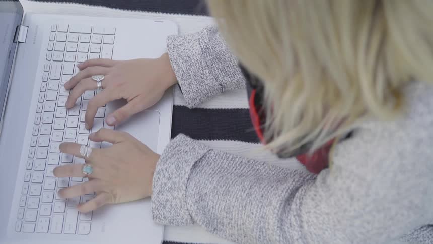 Girl typing on a computer