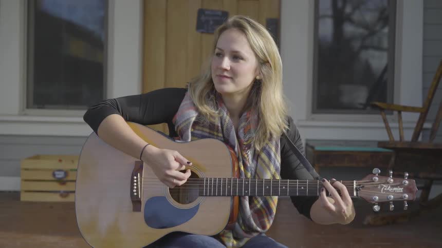 Girl playing guitar