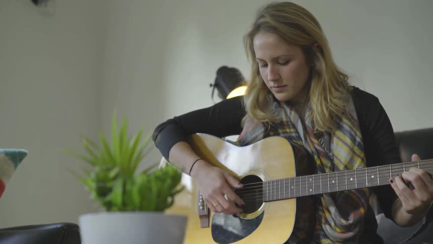 Girl playing guitar