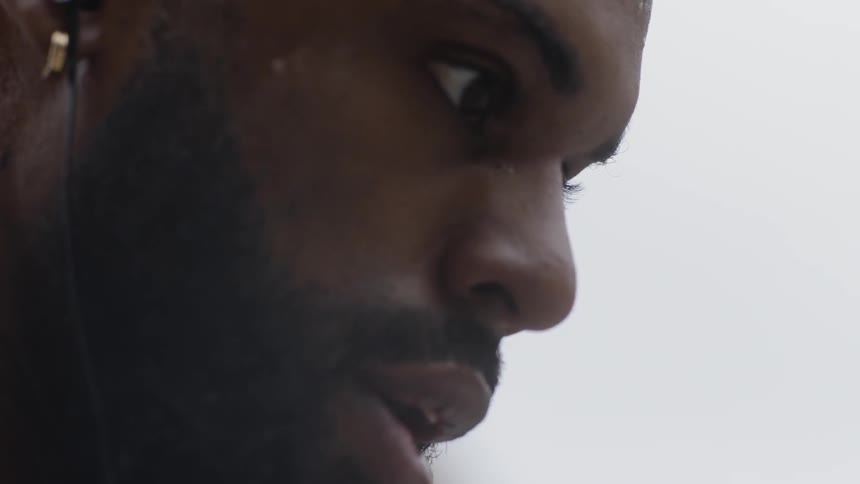 A man shakes his head