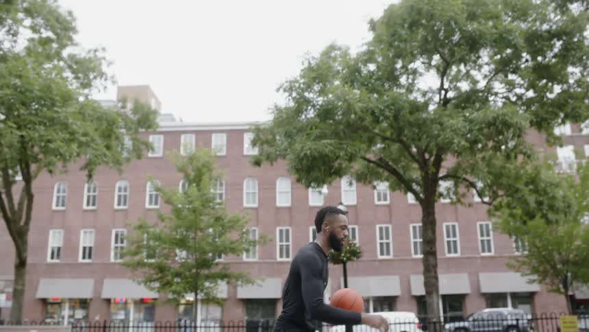 Man playing basketball on a public park
