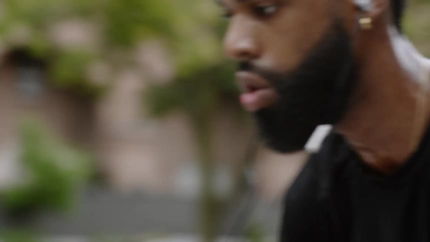 A man dribbles a ball