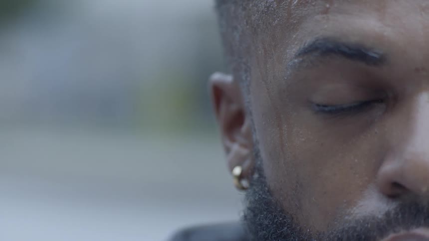 A man blinking his eye