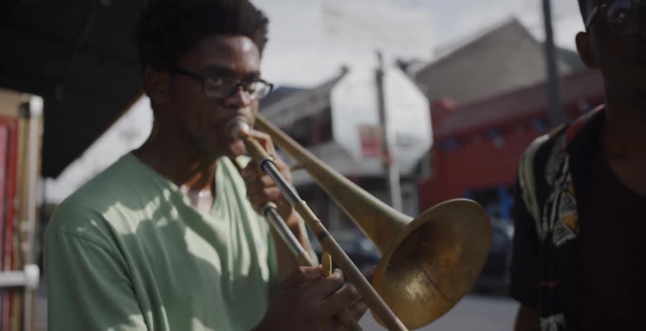 Male playing a trombone