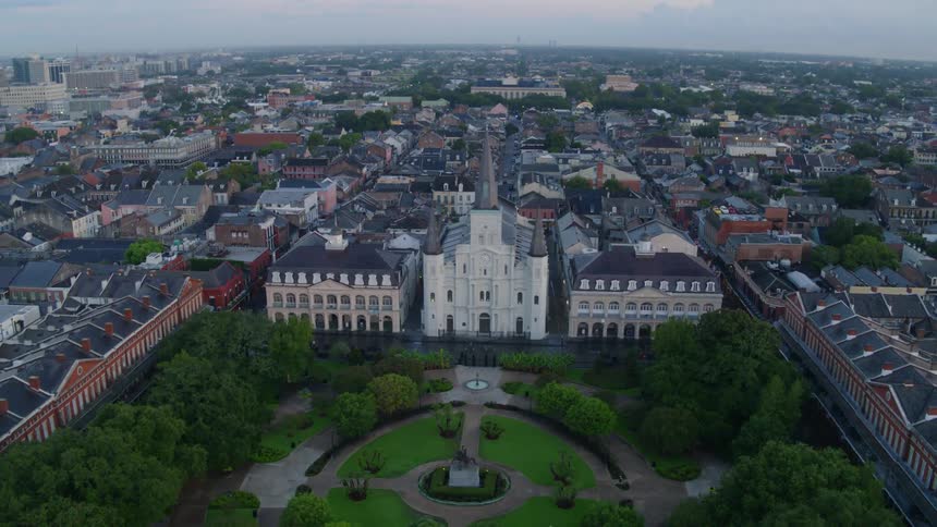 Skyline of the big city with public park at dusk