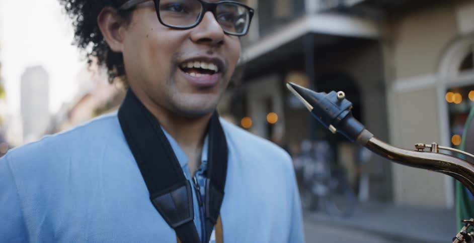 Black man playing sax